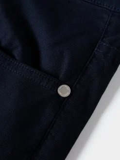 Calças regular fit com cinco bolsos