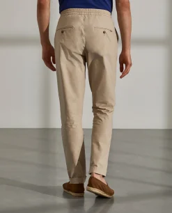 Calças regular fit de algodão com cordão