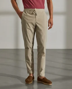 Calças regular fit de algodão com cordão