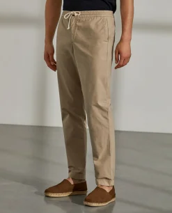 Calças regular fit de algodão com cordão