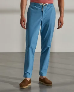 Calças regular fit de algodão com cordão