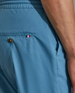 Calças regular fit de algodão com cordão