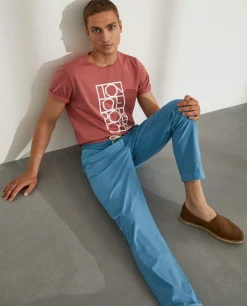 Calças regular fit de algodão com cordão