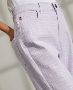 Calças regular fit denim com monogramas