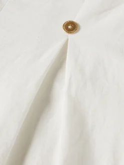 Calças regular fit em algodão e linho