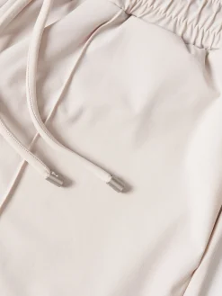 Calças wide leg em malha técnica