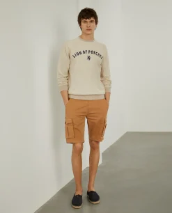 Calções bermuda com bolsos laterais