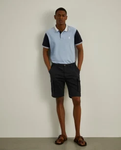 Calções bermuda com bolsos laterais