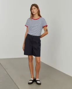 Calções chino com pregas em cupro