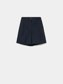 Calções chino com pregas em cupro