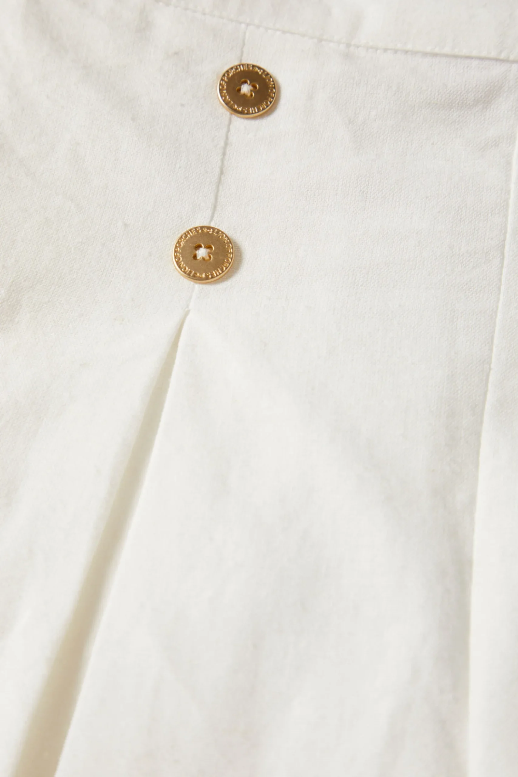 Calções com pregas em algodão e linho