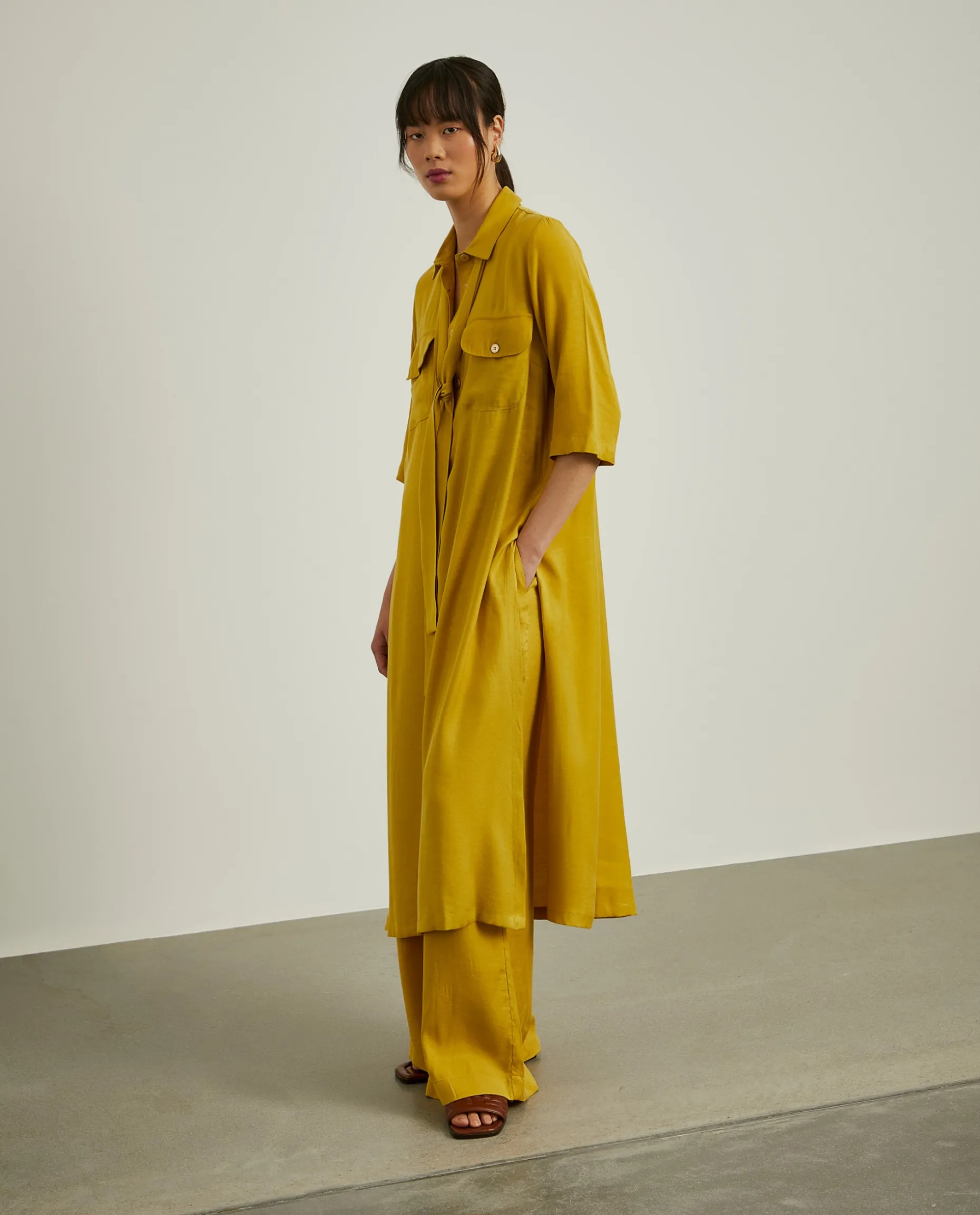 Camisa comprida com laço