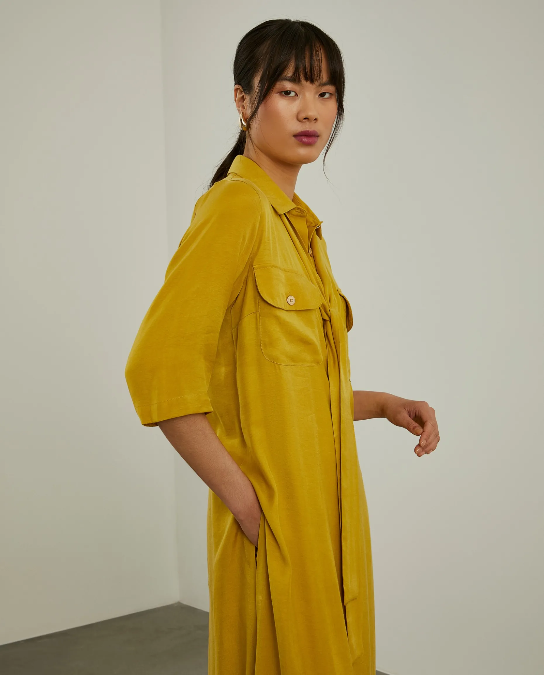 Camisa comprida com laço