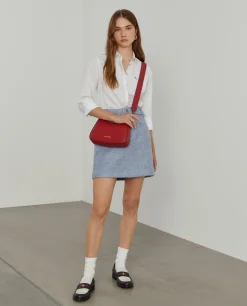 Camisa lisa com riscas finas em contraste