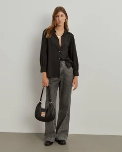 Camisa oversize assimétrica