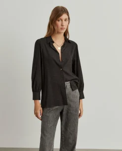 Camisa oversize assimétrica