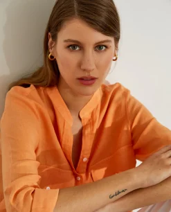 Camisa para mulher comprida em linho com colarinho mandarim