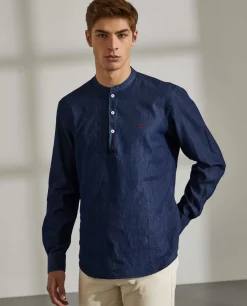 Camisa slim fit denim com carcela de polo