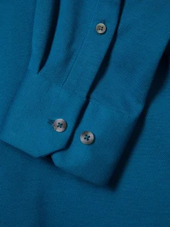 Camisa slim fit em malha piqué com carcela de polo