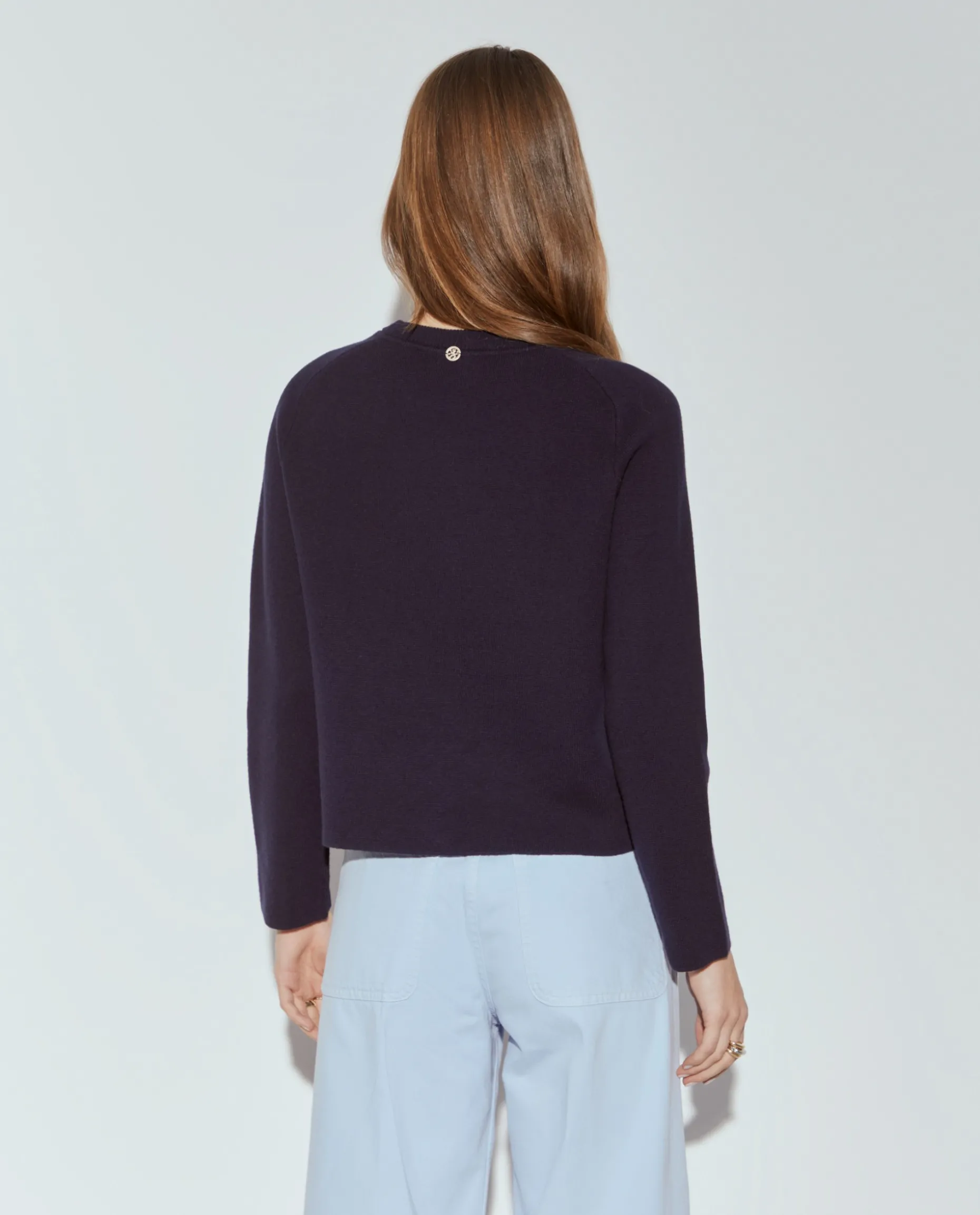 Casaco de malha em lã com molas