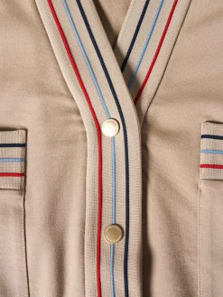 Casaco malha às riscas com bolsos