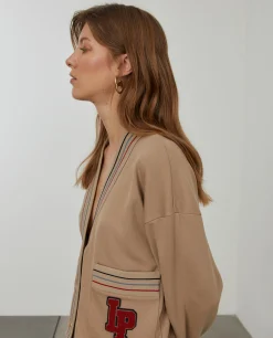 Casaco malha às riscas com bolsos