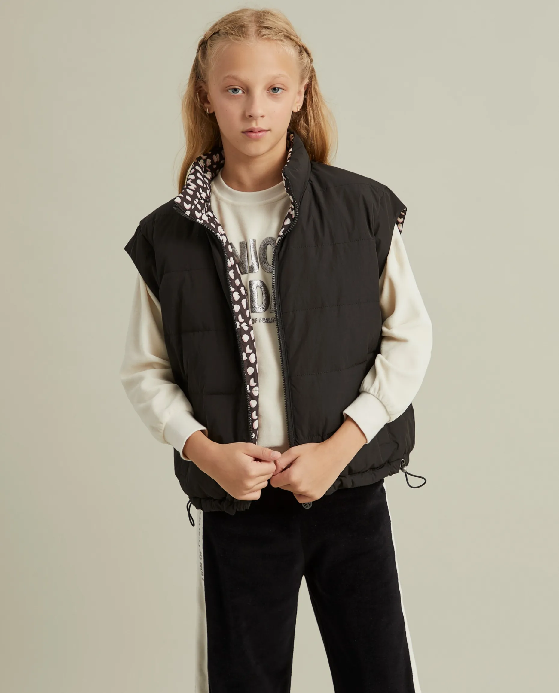 Colete reversível com fecho