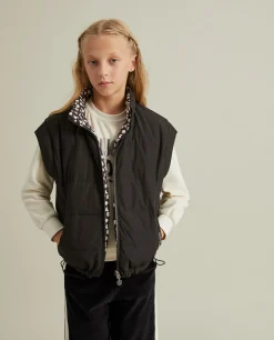 Colete reversível com fecho