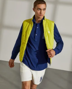 Colete reversível em tecido técnico com bolsos e fecho frontal