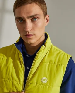 Colete reversível em tecido técnico com bolsos e fecho frontal