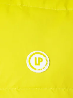 Colete reversível em tecido técnico com bolsos e fecho frontal