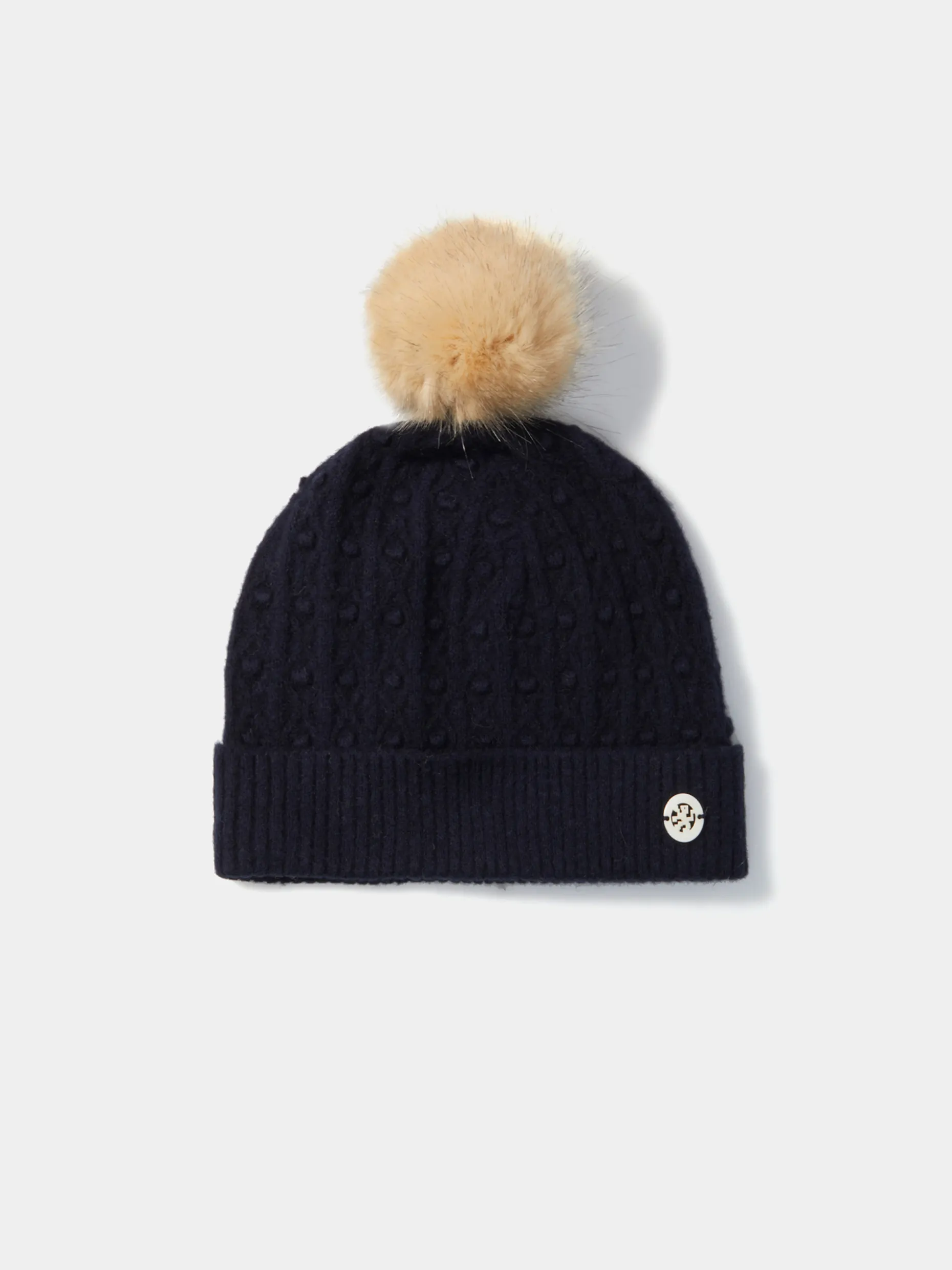 Gorro em malha tricotada com pompom