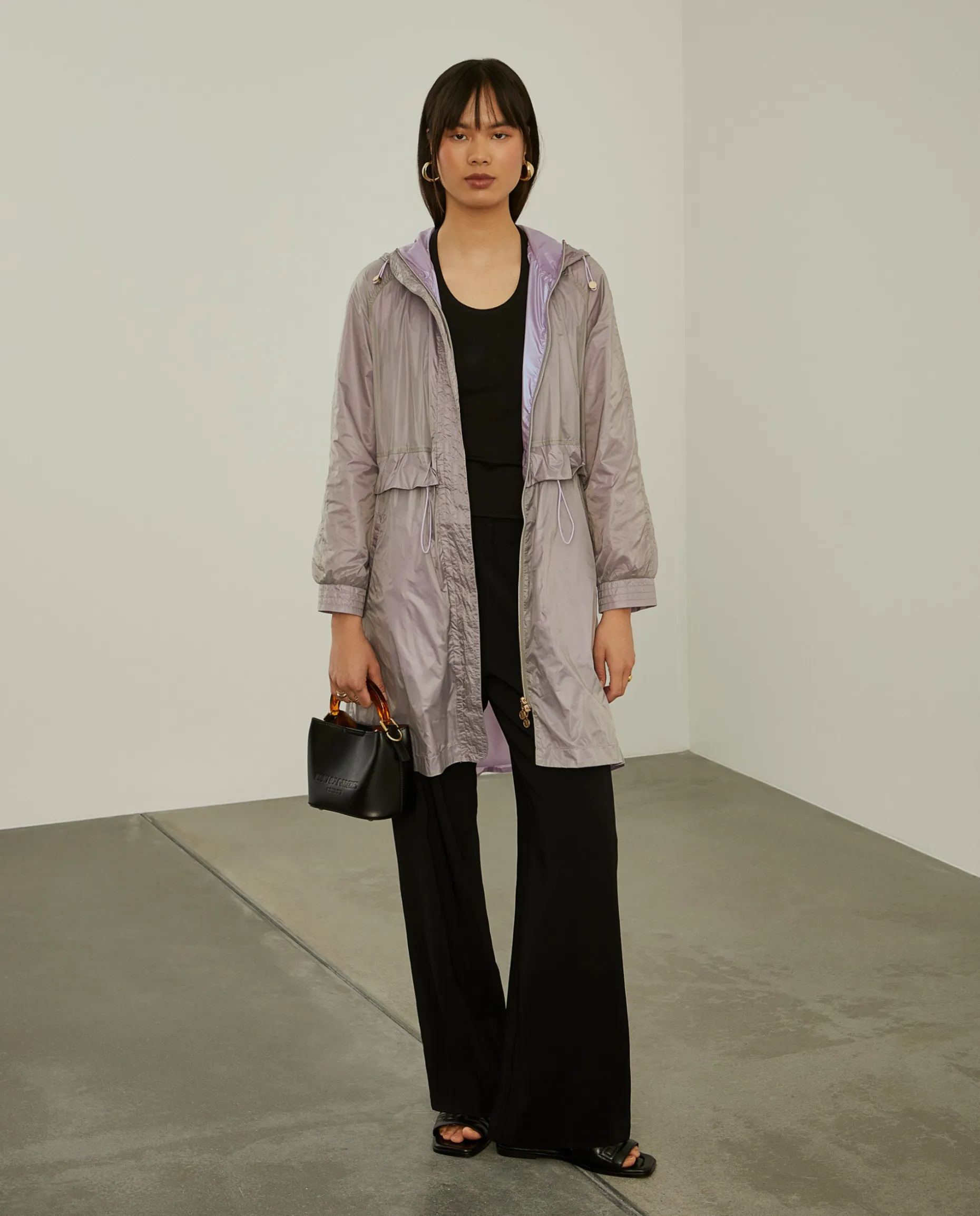 Parka transparente com capuz