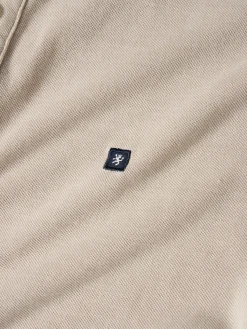 Polo piqué slim fit garment dye