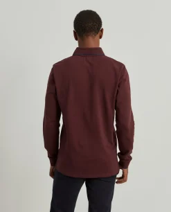 Polo piqué slim fit manga comprida