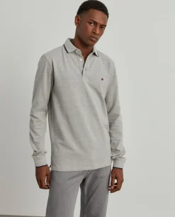 Polo piqué slim fit manga comprida