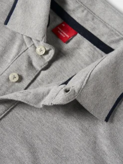 Polo piqué slim fit manga comprida