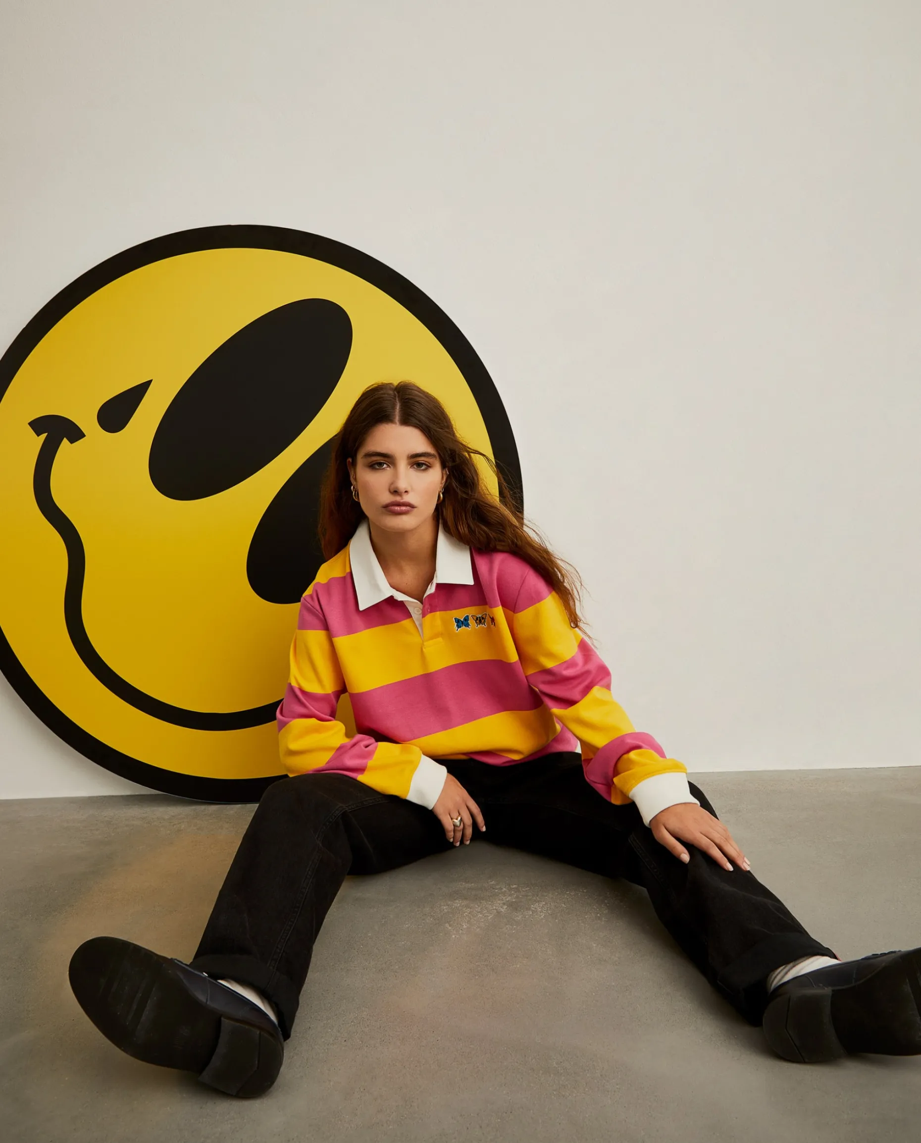 Polo rugby de manga comprida com padrão de riscas