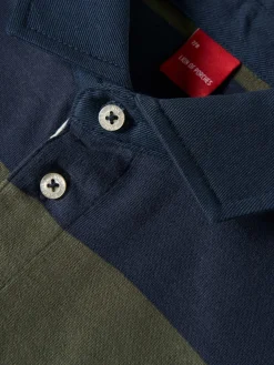 Polo às riscas manga comprida