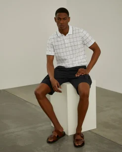 Polo slim fit com padrão quadrados