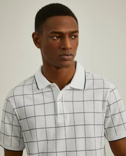 Polo slim fit com padrão quadrados