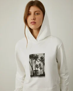 Sweater com capuz e estampado tropical