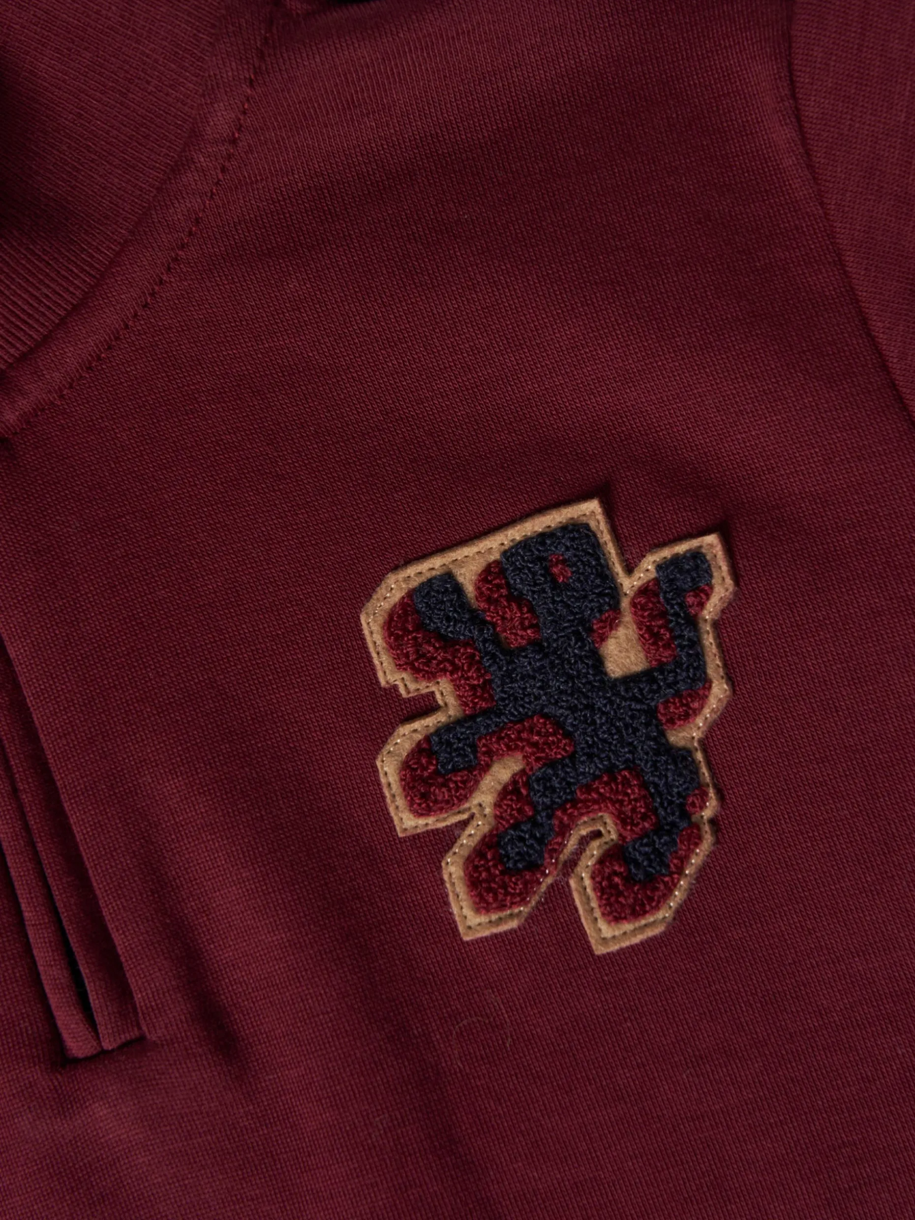 Sweater com fecho e riscas em contraste