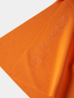 Top em malha com aberturas laterais