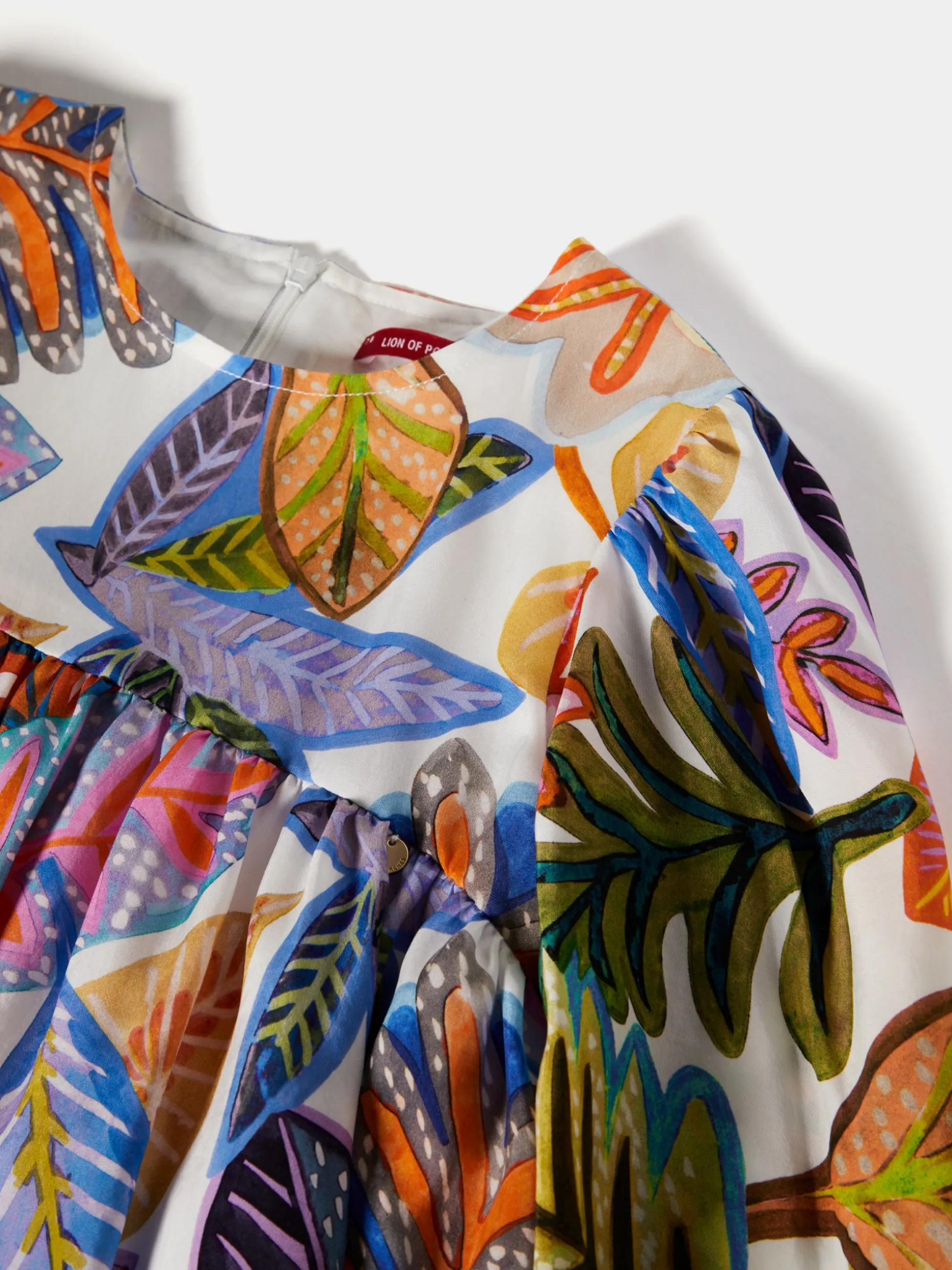 Vestido padrão tropical manga abalonada